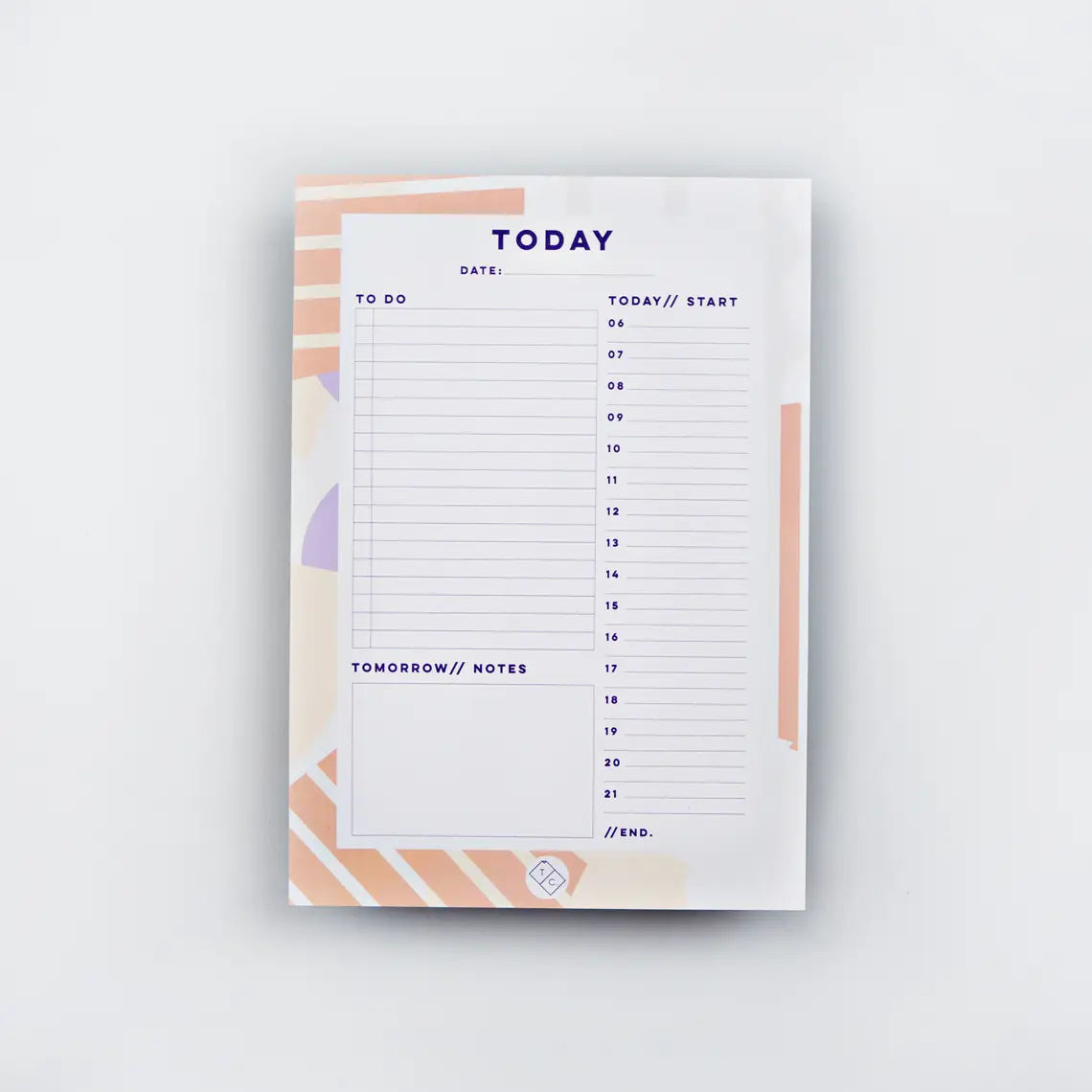 planner pad spots + stripes by the completist, with abstract light orange stripes and white dots