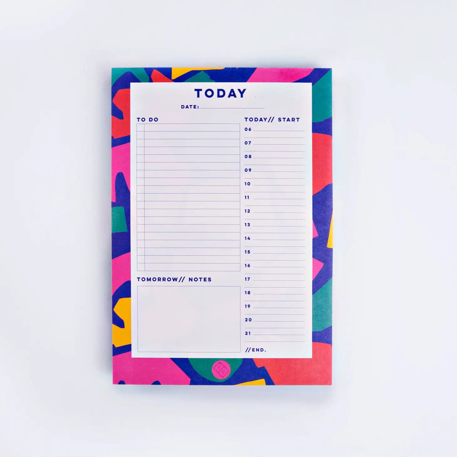 planner pad cut out shapes by the completist, with shapes in bold red, blue, green, pink and yellow