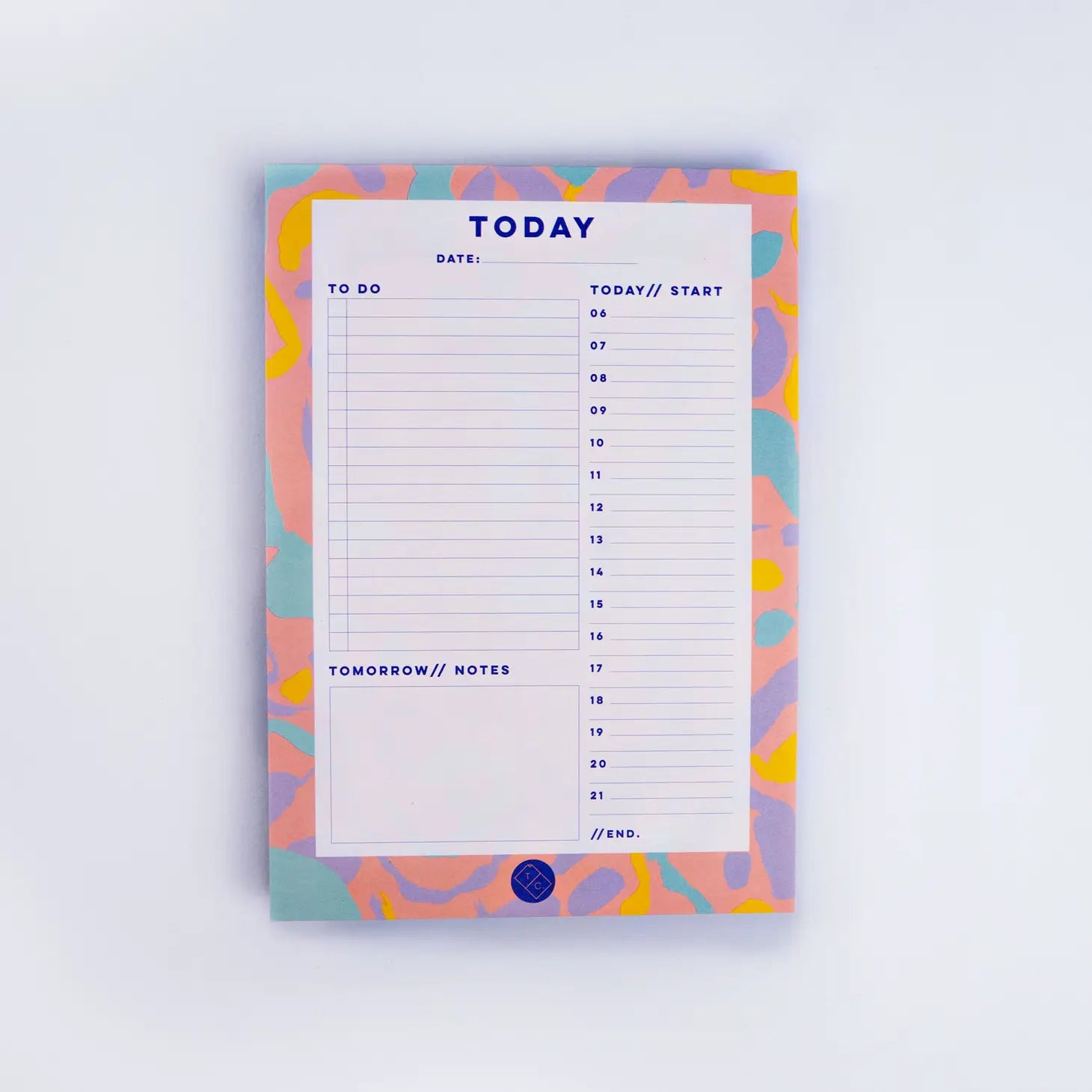 planner pad Inky by the completist, with swirls of yellow, orange, mint and purple