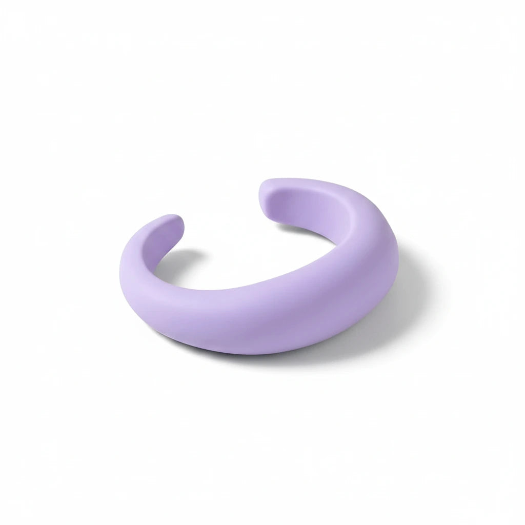 Purple resin cuff bracelet on a white surface 