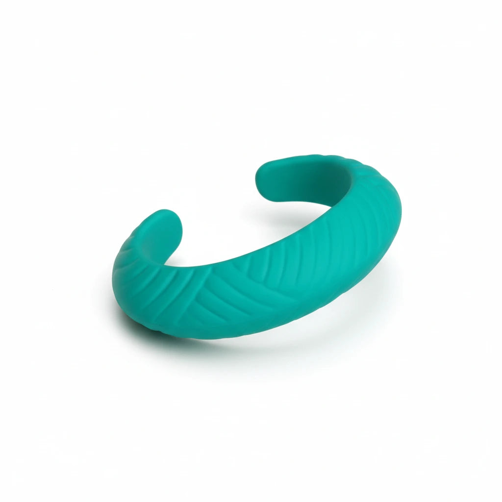 Turquoise resin cuff bracelet on a white background